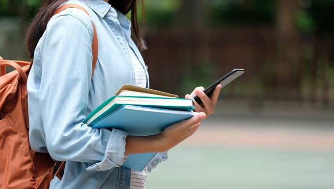 IP_Student_Looking_at_her_Phone.jpg